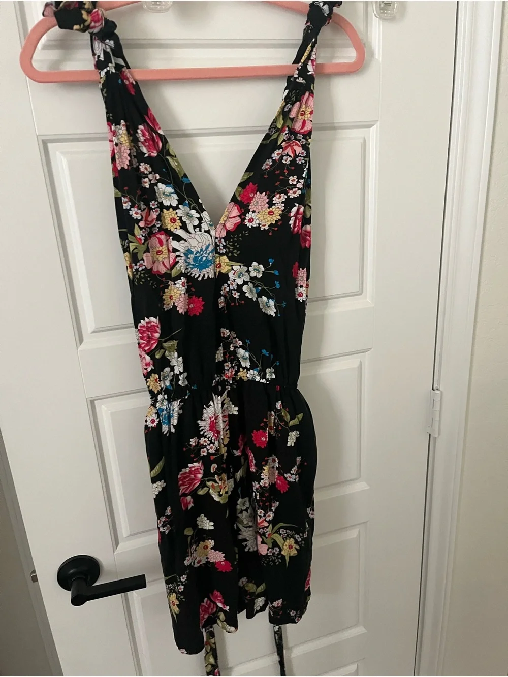 Black floral romper with pink, red, and white flowers - XL